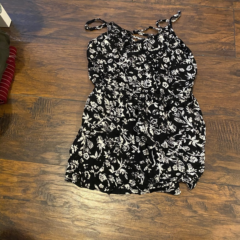 Black romper with white flowers